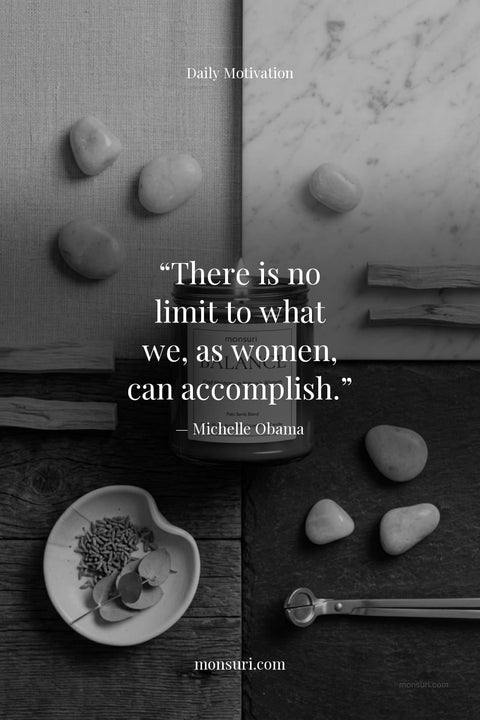 Inspirational quote for women by Michelle Obama: 'There is no limit to what we, as women, can accomplish.' — set on a black-and-white Monsuri Balance candle scene, from the 50 women empowerment quotes collection on strength and resilience.