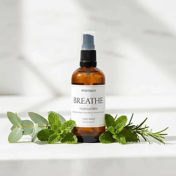 Eucalyptus hydrosol room spray bottle with natural peppermint face mist on white background