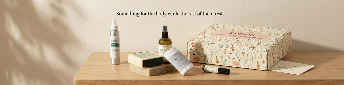 Something for the body while the rest of them rests - the five pieces on a wooden table with the Monsuri botanical gift box and a card