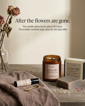 After the flowers are gone - the candle alone burns about 45 hours and the smaller comforts stay close for the days after, shown beside a vase of dried roses