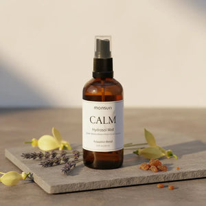 Close-up of fine mist from lavender hydrosol aromatherapy spray bottle