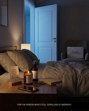 For the person who is still scrolling at midnight - the Mindful Pause set laid out on a bedside table in a dark bedroom