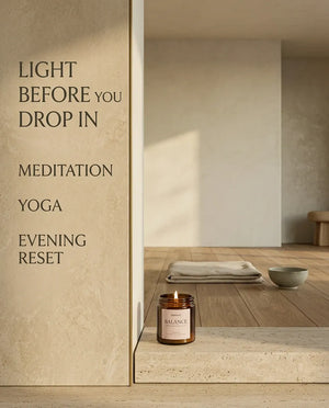 Monsuri BALANCE candle lit in a minimalist room labeled for meditation, yoga and evening reset rituals before you drop in.