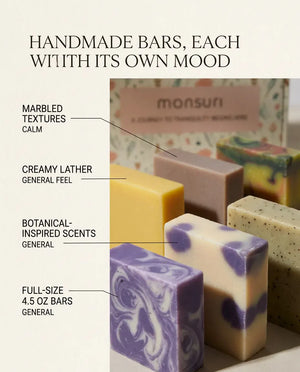 Handmade cold-process bars, each with its own mood — marbled textures, creamy lather, and botanical scents in the Rest & Renewal set.