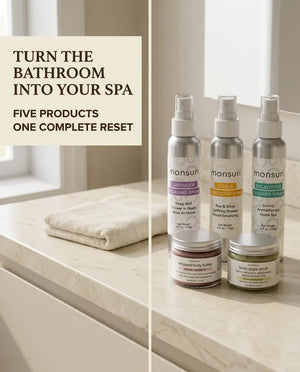 Monsuri Sensory Symphony gift set on a bathroom counter beside a folded towel, five products for one complete reset.