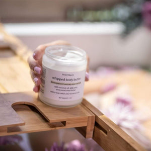 Open jar of Monsuri's Body Butter with Lemongrass and Rosemary essence.