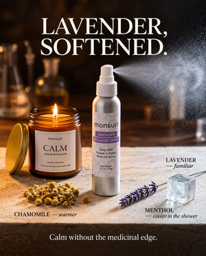 Lavender, softened - the CALM lavender and chamomile candle beside the 4 fl oz lavender relaxing shower spray, with chamomile for warmth, lavender for the familiar note and menthol for a cooler finish in the shower