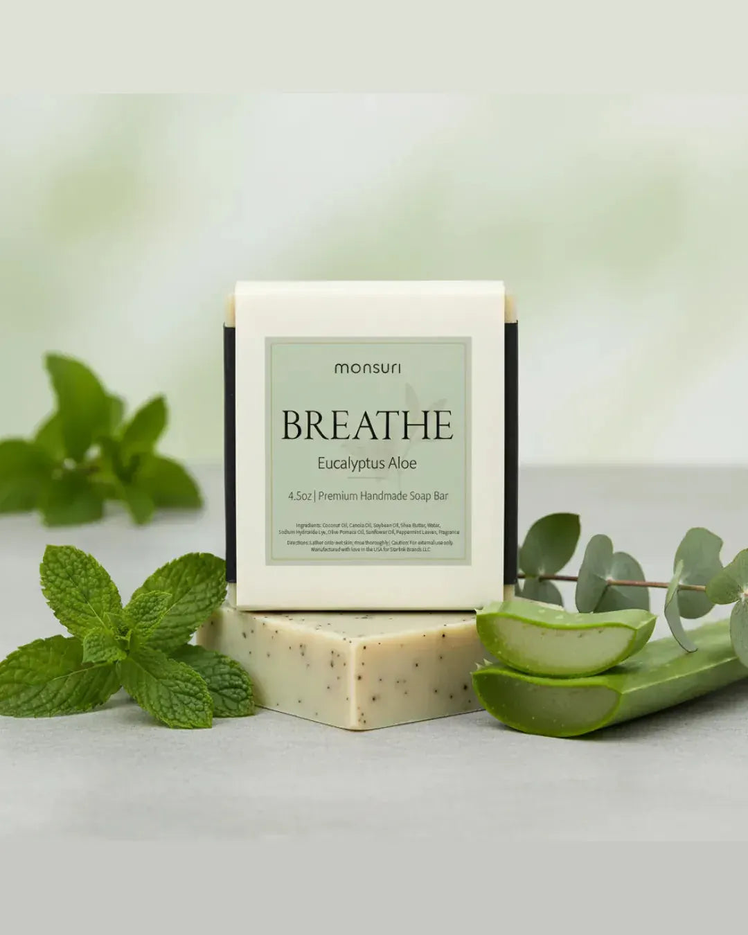 Monsuri Breathe Eucalyptus Aloe handmade soap bar with natural peppermint leaves and eucalyptus botanical ingredients for mental clarity and shower aromatherapy