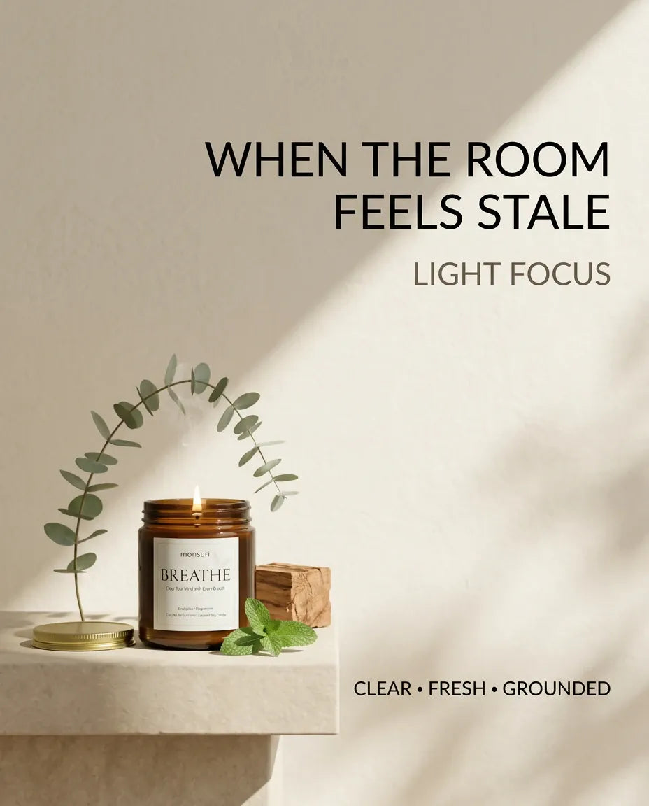 Infographic card for Monsuri BREATHE candle reading 'When the room feels stale, light Focus' with the candle glowing on a stone ledge under eucalyptus.
