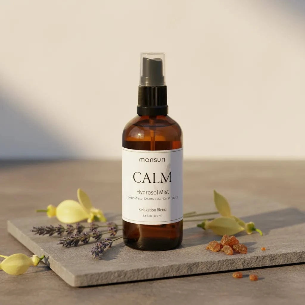 Close-up of fine mist from lavender hydrosol aromatherapy spray bottle