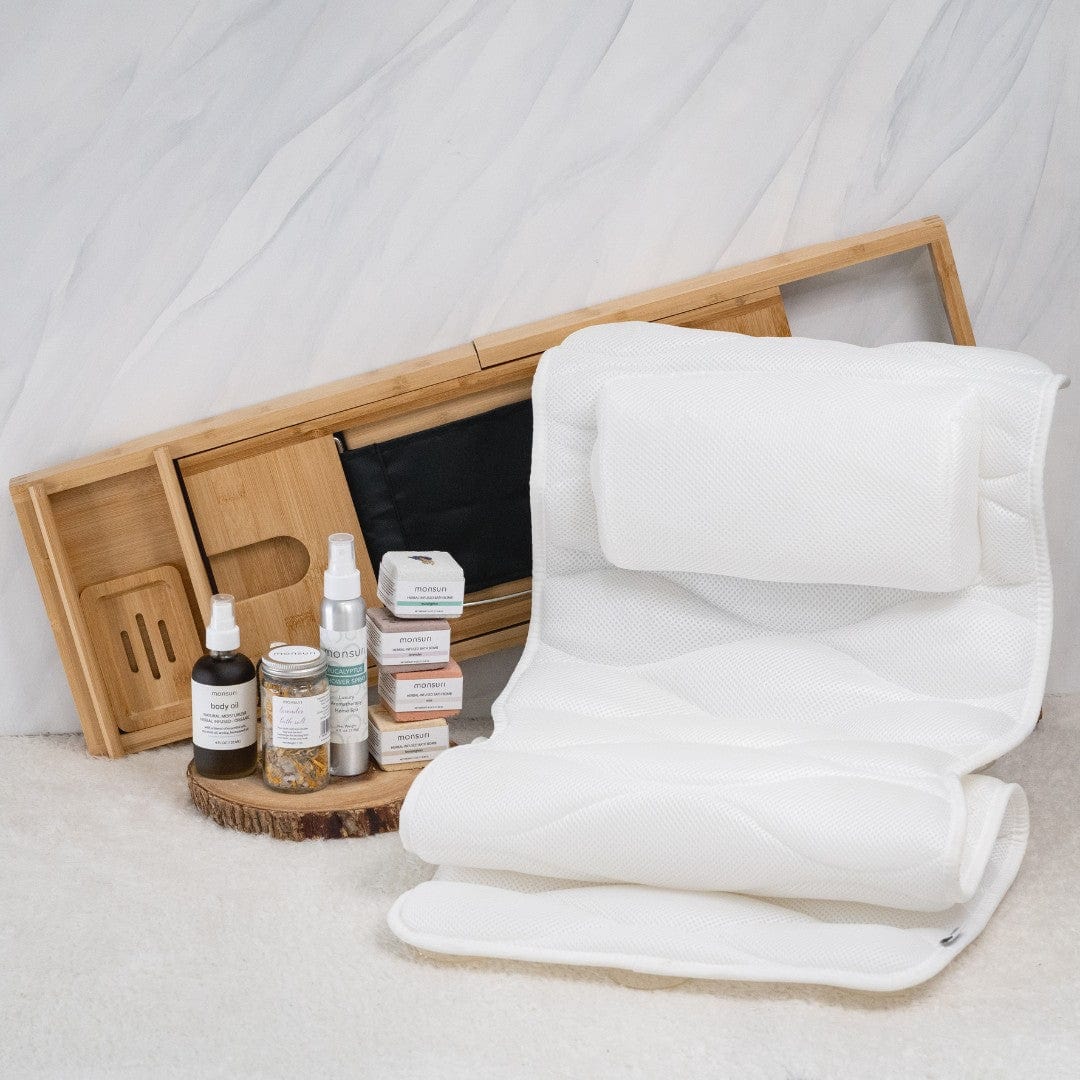 at home spa bath gift basket including full body bath pillow, bath tray, body oil, bath salts, eucalyptus shower spray and bath bombs set