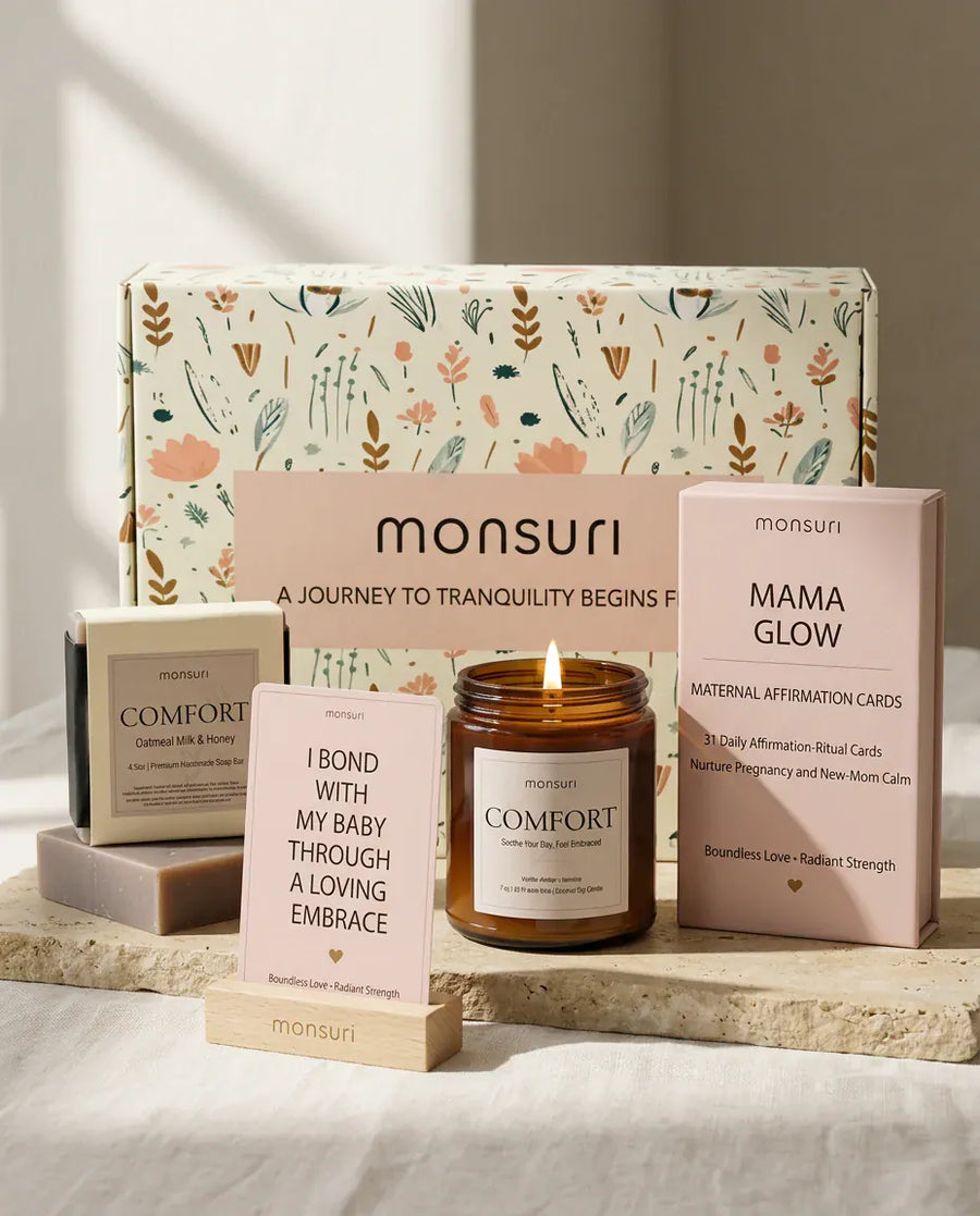 All three pieces of the Mama Glow set with the botanical gift box - the MAMA GLOW deck of 31 maternal affirmation cards, a card in its wooden stand, the COMFORT candle and the oatmeal milk and honey soap bar