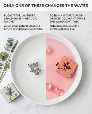 Only one of these changes the water: eucalyptus, lavender and lemongrass use real oil and no dye, leaving the water clear, while rose uses a natural rose-derived colorant that turns it soft pink — shown side by side in two white basins.