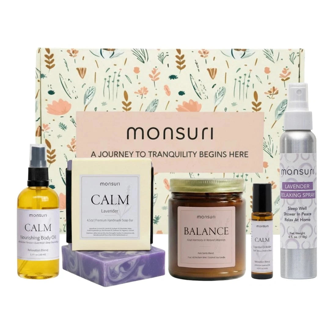 Retirement Relaxation Gift Set with palo santo lavender candle, shower spray, soap bar, body oil and essential oil roller in minimalist botanical packaging