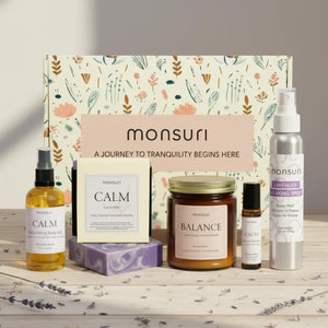 Retirement Relaxation Gift Set with palo santo lavender candle, shower spray, soap bar, body oil and essential oil roller in minimalist botanical packaging