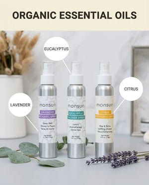 Monsuri Sensory Symphony gift set's three organic essential oil sprays labeled lavender, eucalyptus, and citrus.