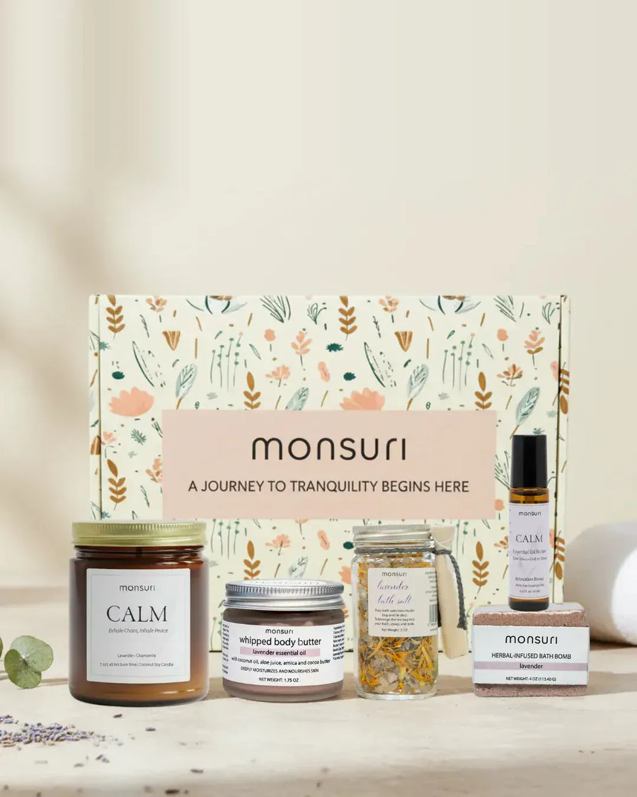 The botanical kraft gift box as it ships — kraft shred, a eucalyptus sprig, the note inside.