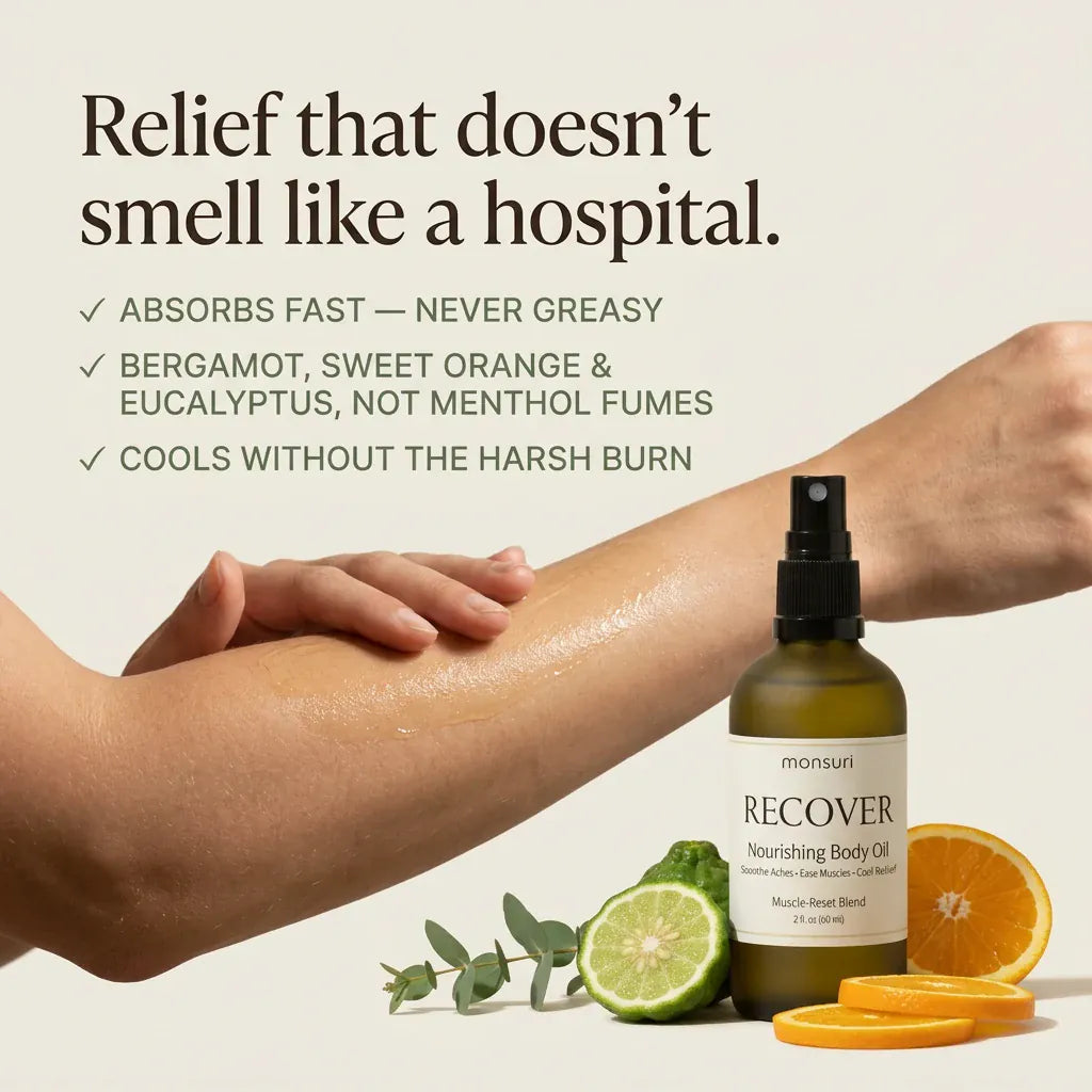 Non-greasy sore muscle massage oil absorbing into skin, scented with bergamot, sweet orange and eucalyptus — Monsuri RECOVER