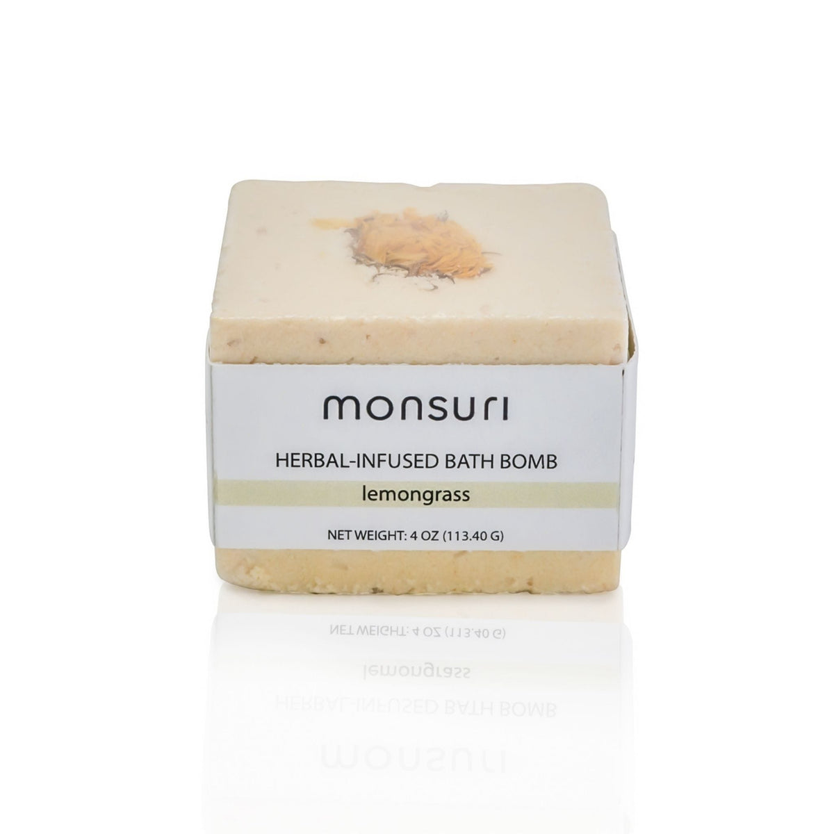 Refreshing Lemongrass Bath Bomb by Monsuri against a bright white background.