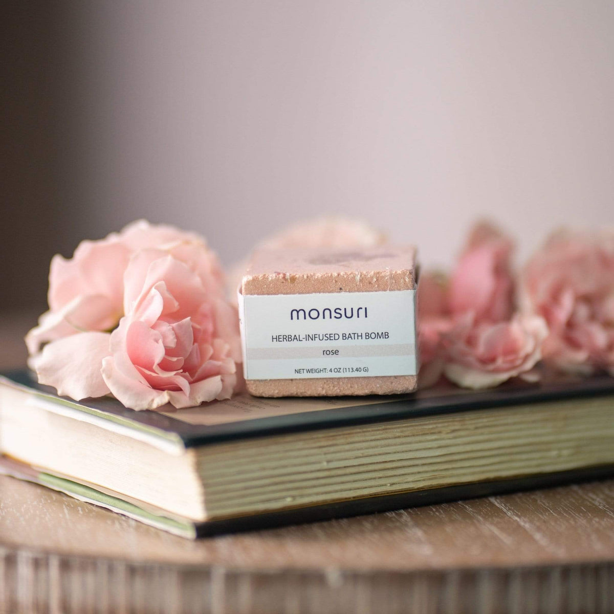 Relaxing bath time experience with Monsuri's aromatic Rose Bath Bomb.