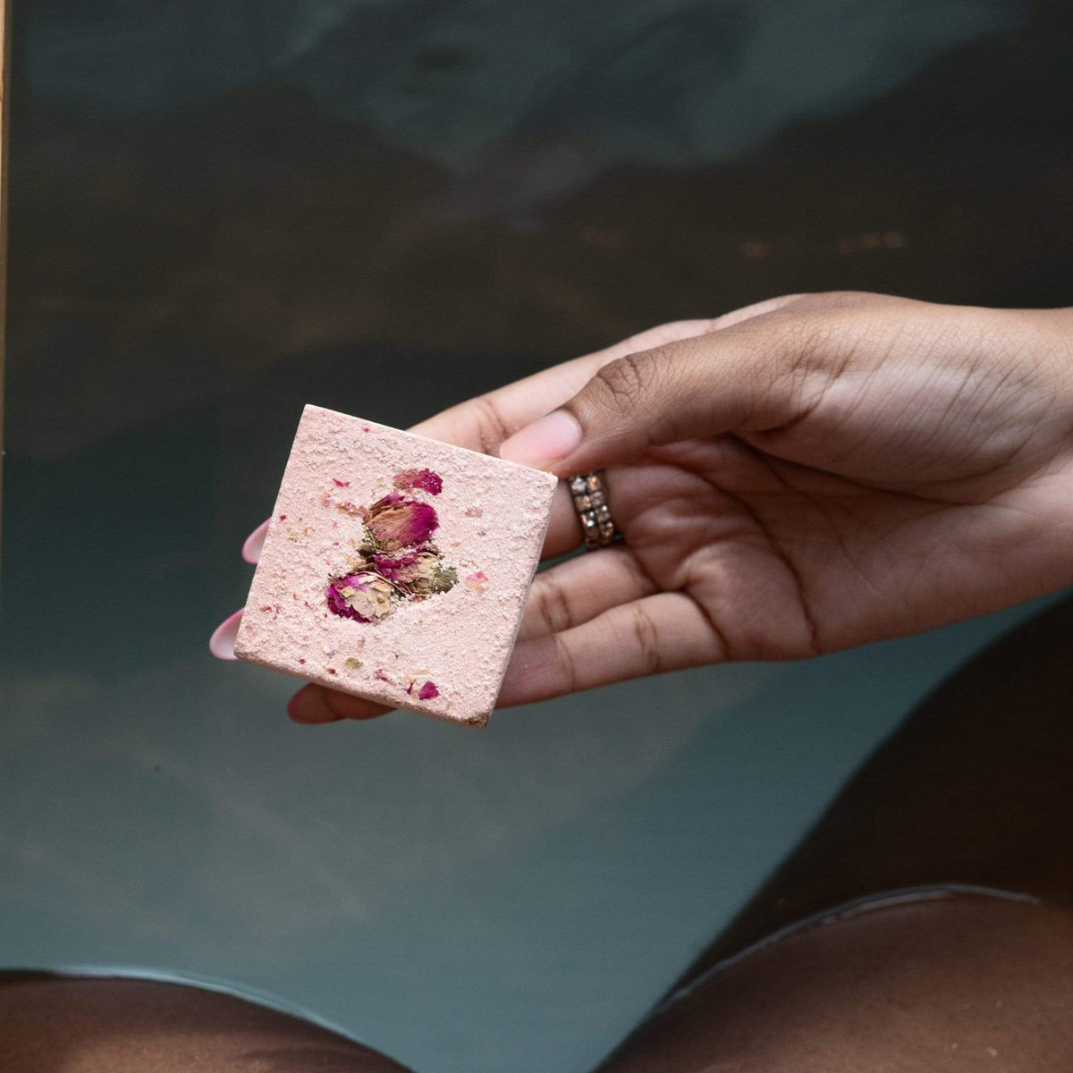 Monsuri Restorative Rose Bath Bomb for a tranquil spa-like bath experience at home.