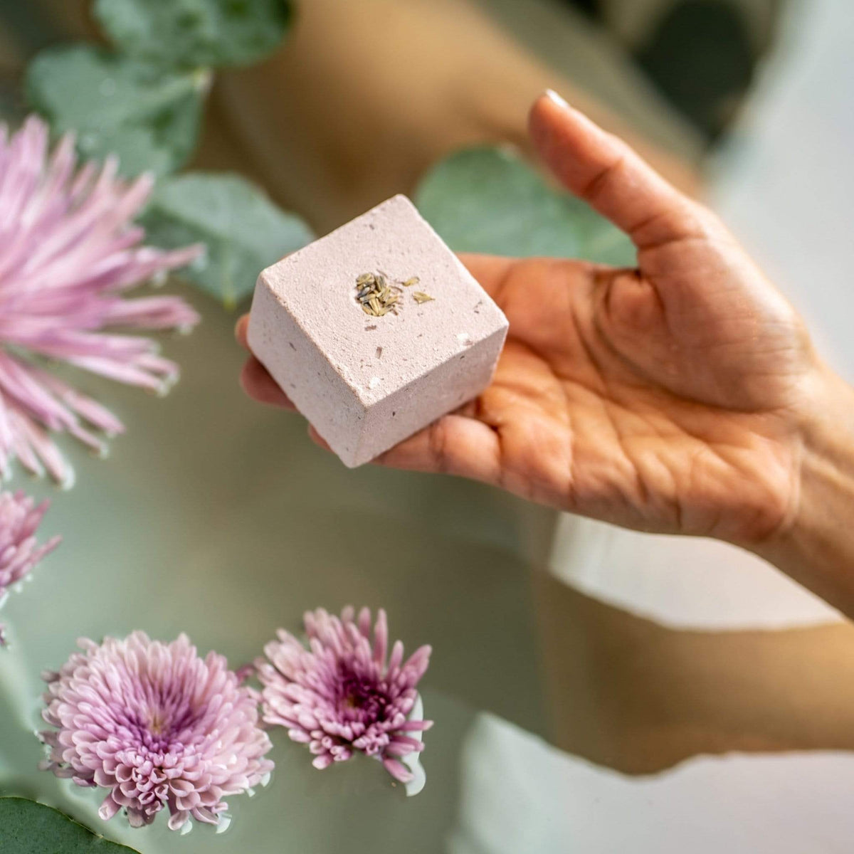 Handcrafted Tranquil Lavender Bath Bomb by Monsuri in soothing purple hues.