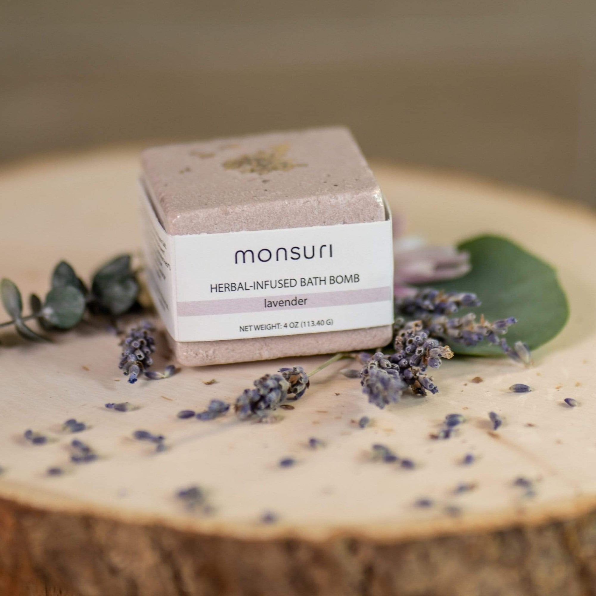 Close-up of Monsuri's Lavender Bath Bomb revealing fine organic ingredients.